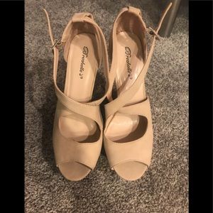 Breckelle’s open toed wedge platforms